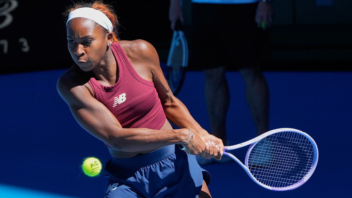 Coco Gauff returns a backhand