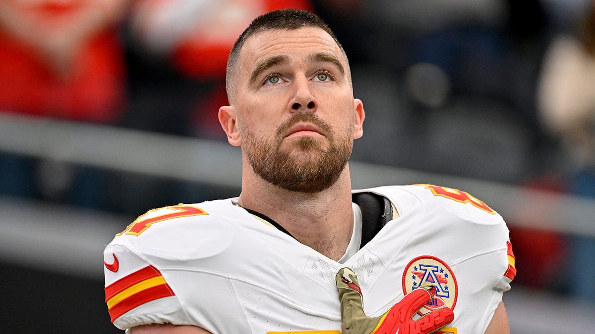 Travis Kelce looks on