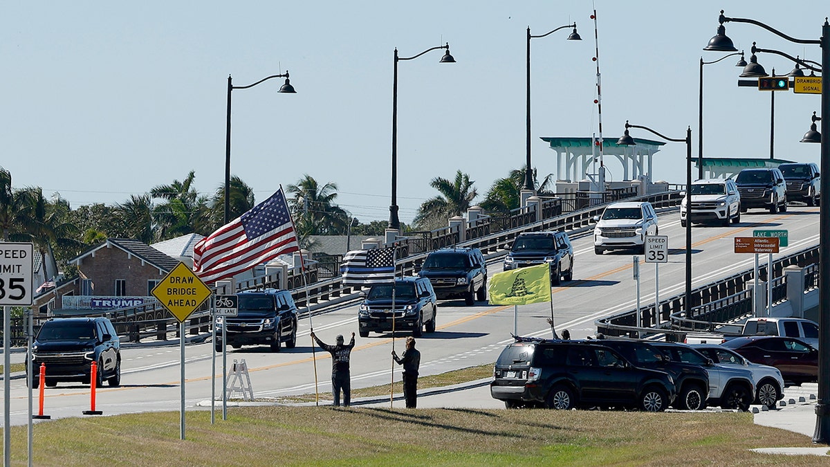 President Trump's motorcade passes along Southern Boulevard as it returns to Trump's Mar-a-Lago Club.