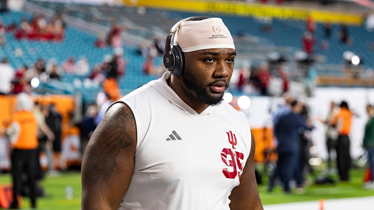 Tyrique Tucker warms up before game