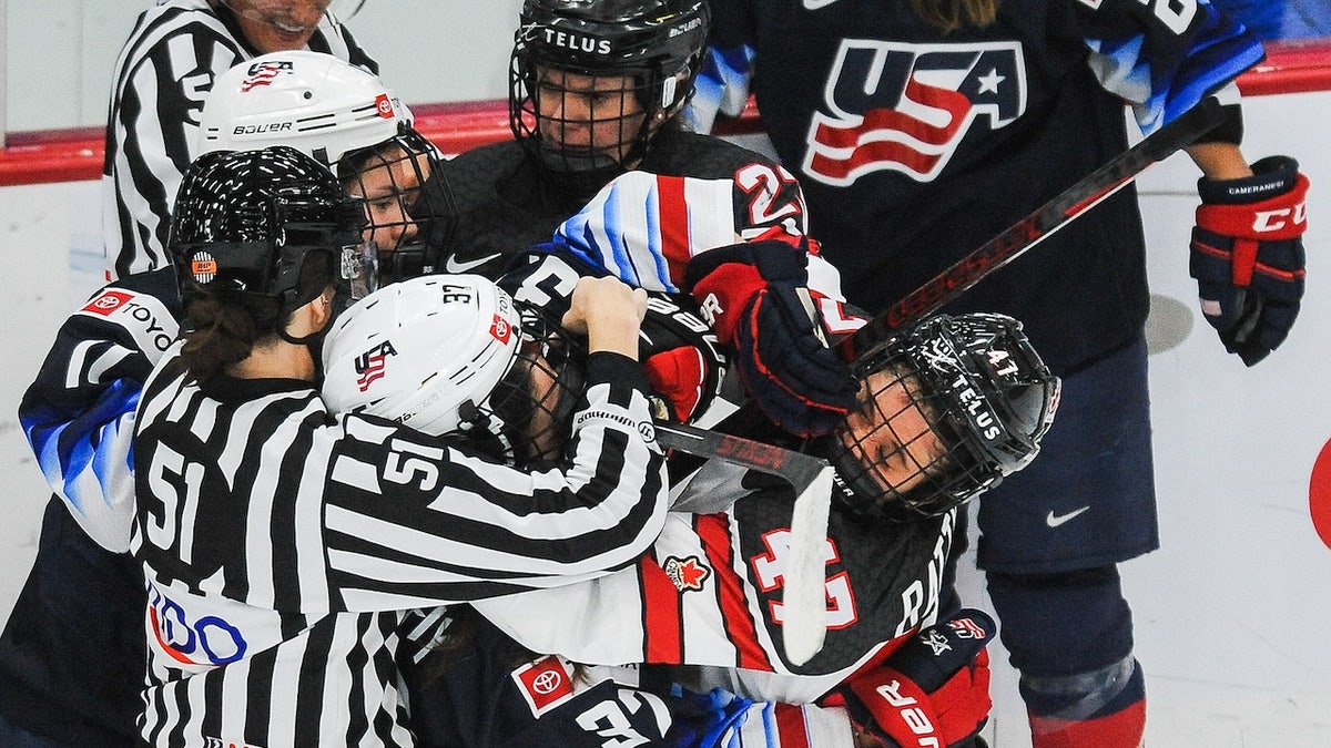 Jamie Rattray of Canada fights Abbey Murphy