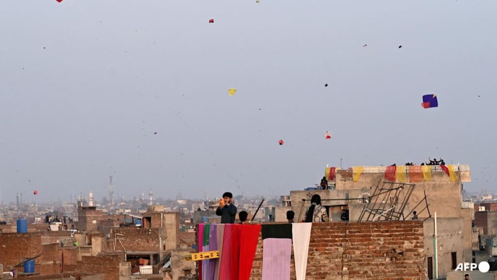 Colour and caution as banned kite-flying festival returns to Pakistan