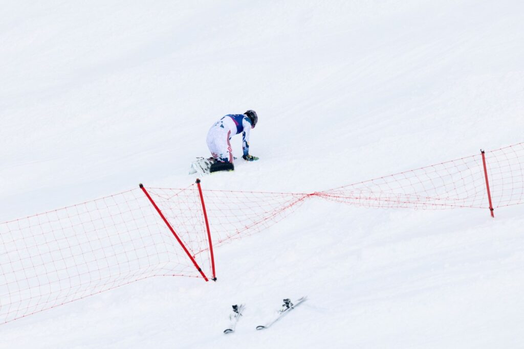Olympic Skier Collapses Into Snow After Missing Gold Olympic Skier Collapses Into Snow After Missing Gold