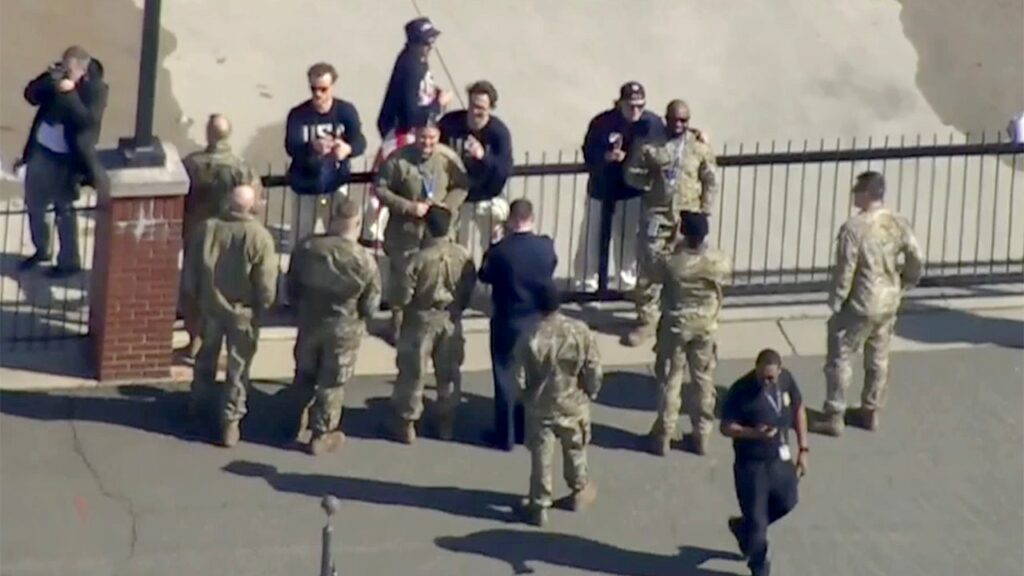 US men’s hockey stars share gold medal moment with military members before White House visit