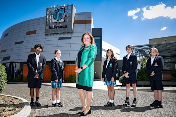 St Francis Catholic College principal Marlene Jorgensen with year 7 students (from left) Jayden, Emily, Chloe, Patrick and Tyler.