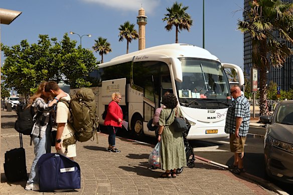 Foreign nationals at an evacuation point in Tel Aviv where the Australian embassy evacuated citizens in June 24, 2025.