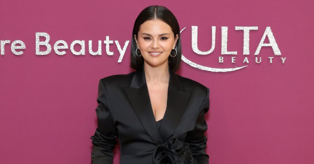Selena Gomez’s Silky, Waist-Cinching Dress Is the Definition of Business-Chic Style