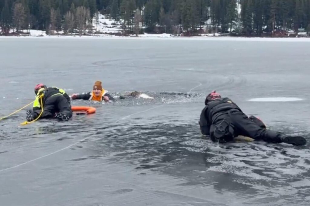 Washington man falls through ice into frigid lake — right in front of cops practicing water rescues