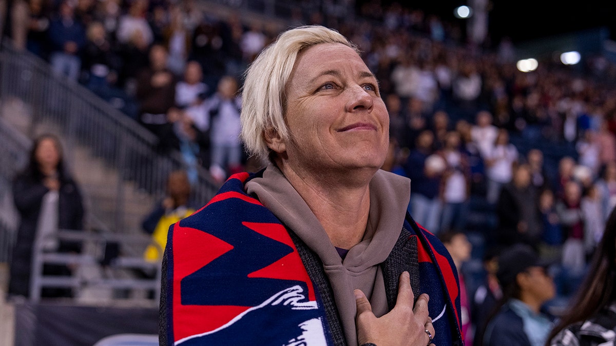 Abby Wambach smiles on field