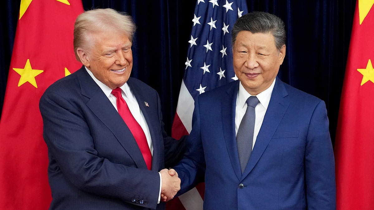 U.S. President Donald Trump shakes hands with Chinese President Xi Jinping