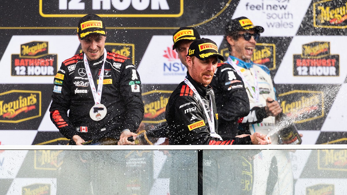 Team GMR drivers celebrate