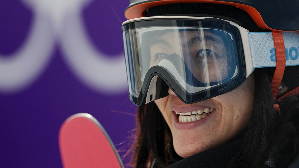Jiayu Liu reacts after Olympic snowboard event