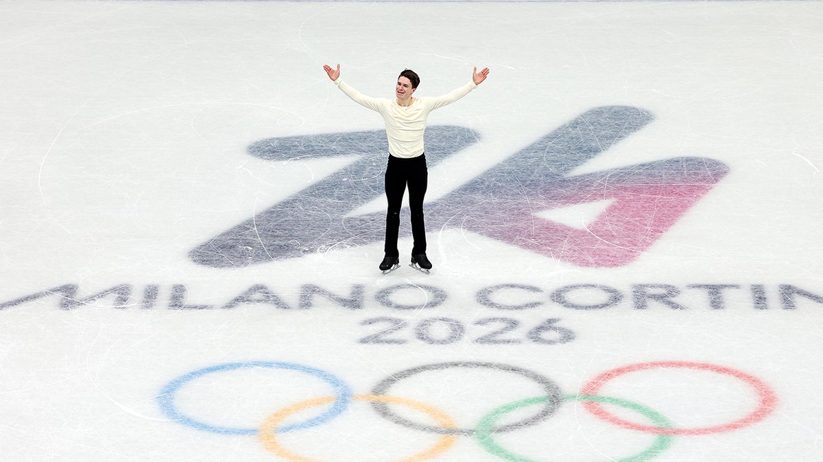 Maxim Naumov salutes crowd at Olympics