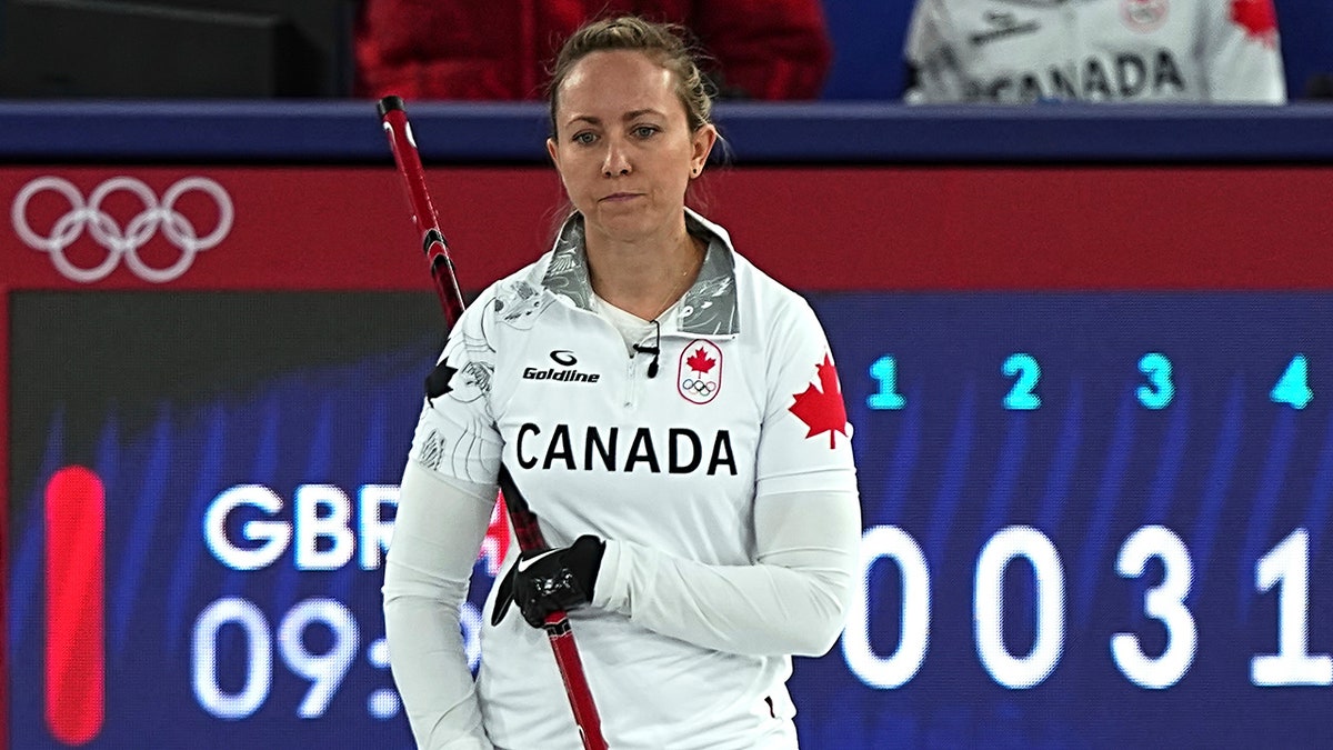 Rachel Homan looks on