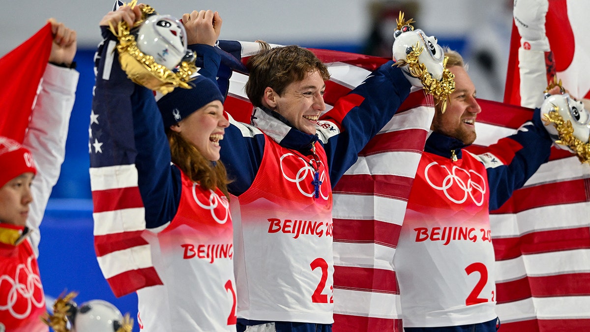 Christopher Lillis poses with American flag