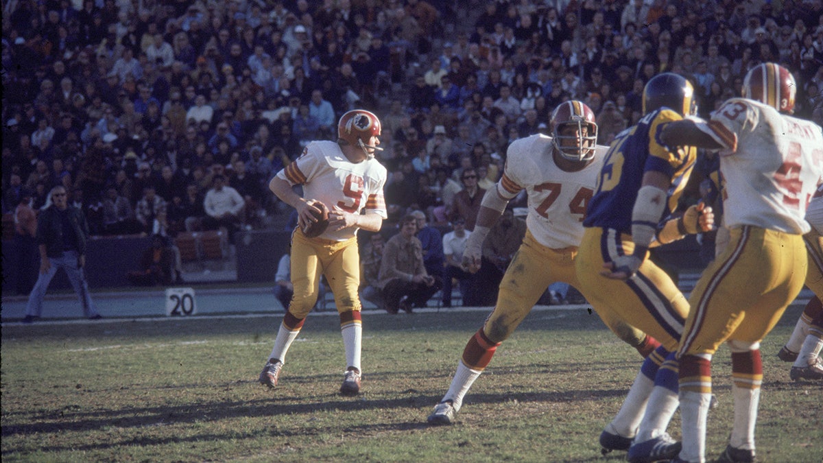 Sonny Jurgensen in action