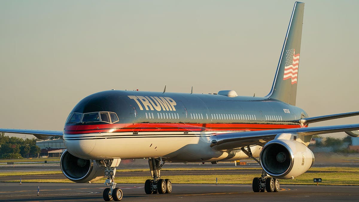 Trump Force One plane at sunset