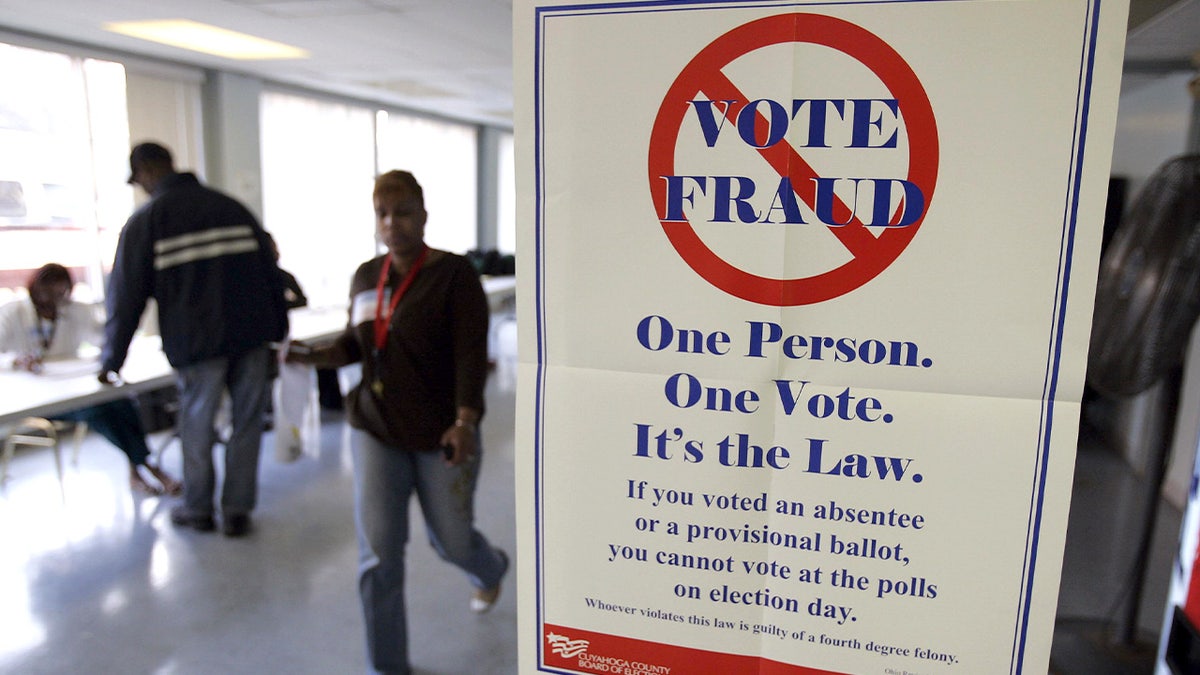 Sign warning against voter fraud