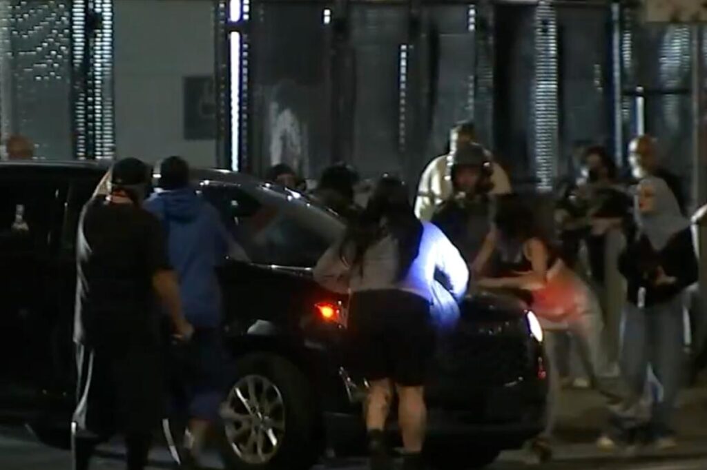 Anti-ICE agitator tries to block SUV at DTLA federal building