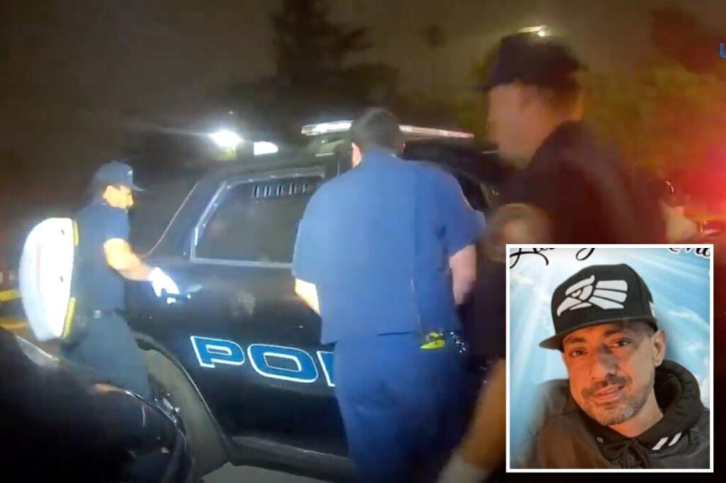 Exclusive | Shocking bodycam footage shows moment cops discovered dead man in police car