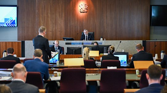 Commissioner Stuart Wood listens to senior counsel assisting, Patrick Wheelahan, during last month’s hearings.