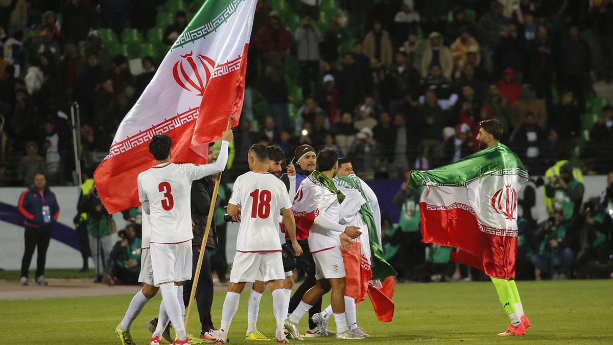 Iran soccer team celebrates