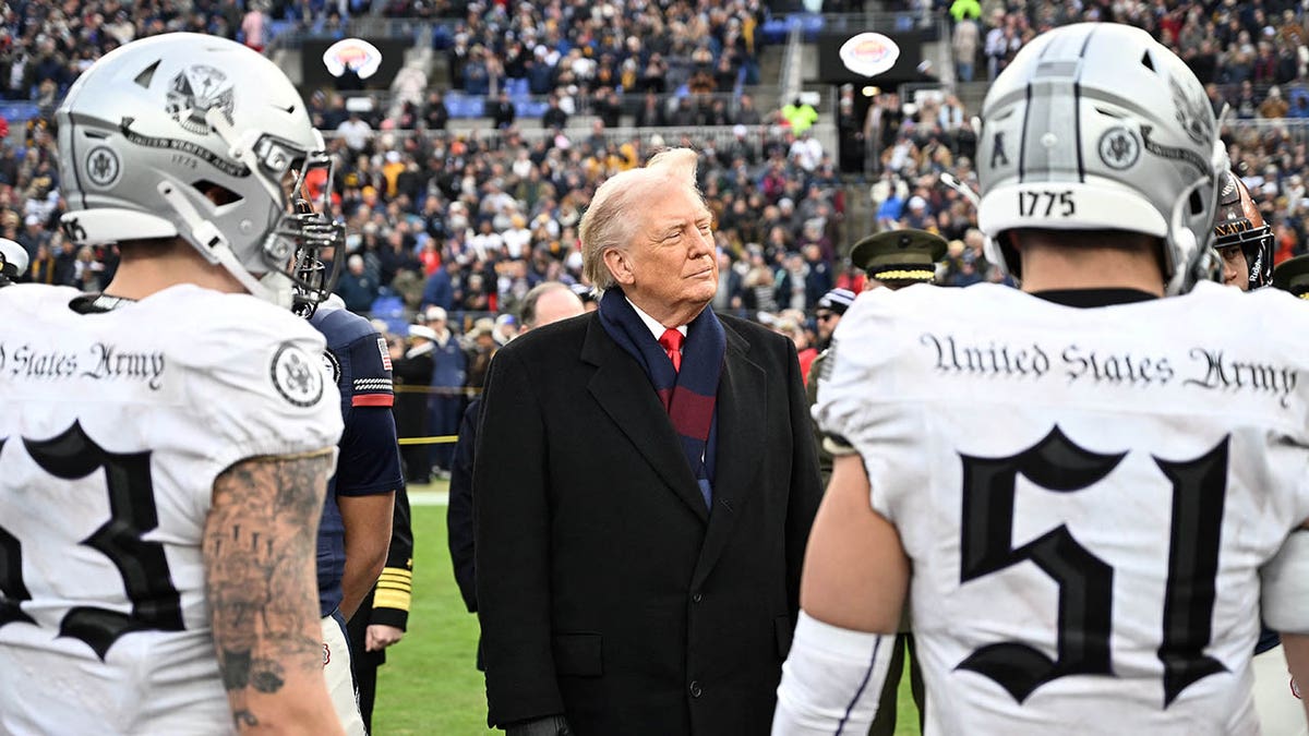 Trump looks on before a game