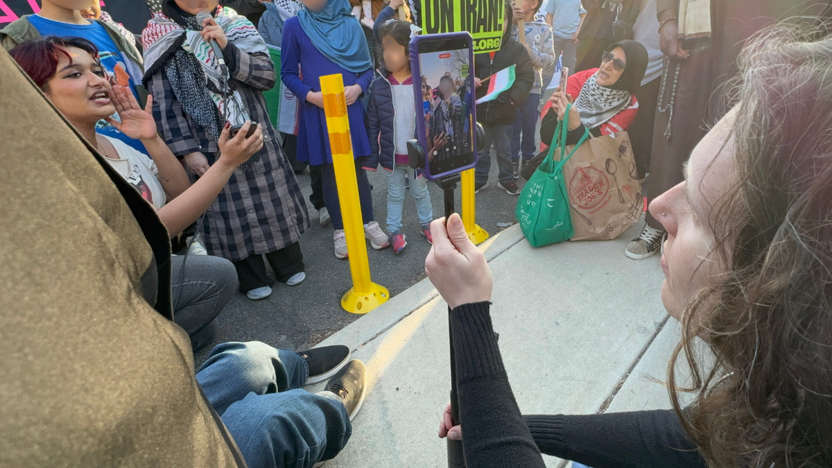 Members of the Party for Socialism and Liberation filmed children supporting the regime in Iran, during a protest on Saturday, March 7, 2026, in Washington, D.C.