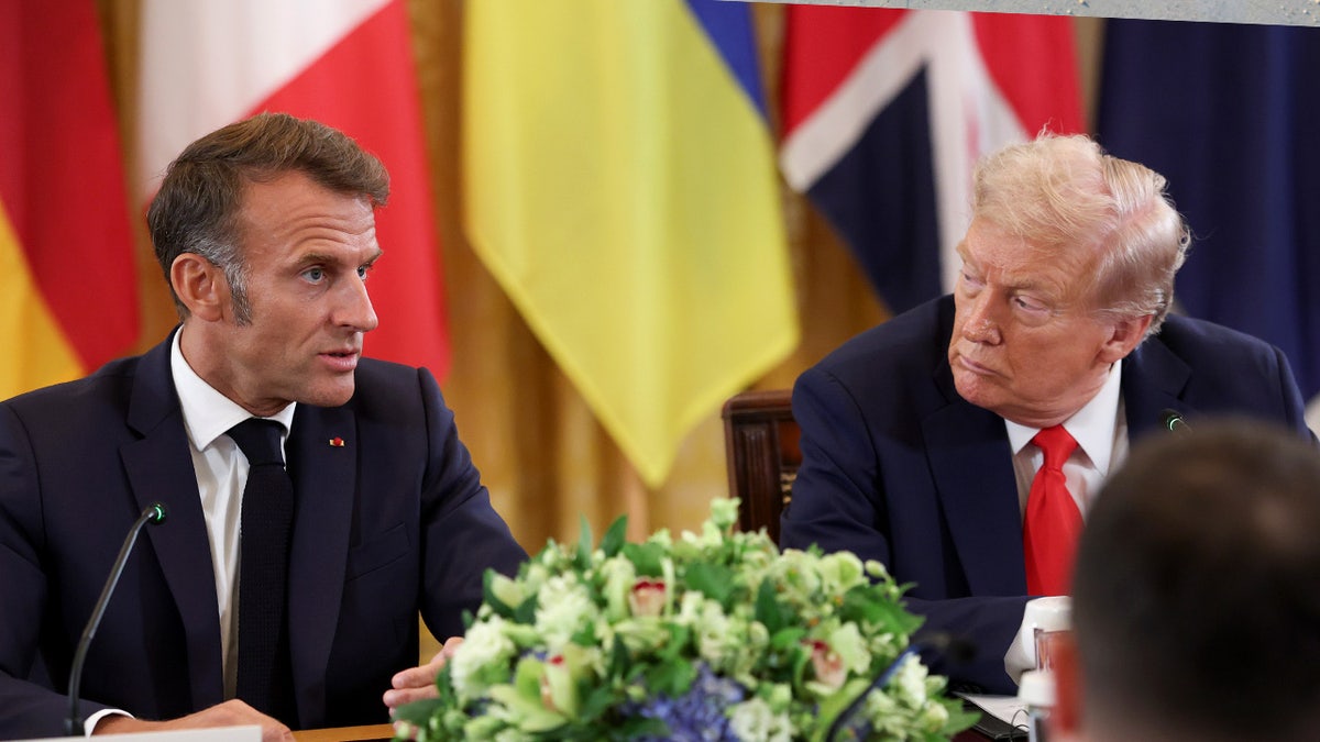 Trump and Macron speaking during a meeting