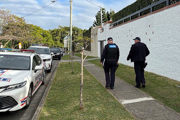 Police near the crime scene in Clayfield.