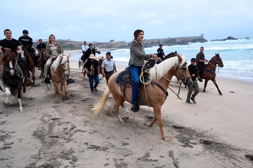 Noem riding a horse on a beach with Ecuador President Daniel Noboa in Manta, Ecuador on Nov. 5, 2025.