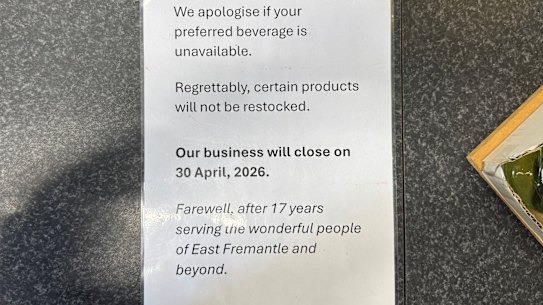 A sign at Cellarbrations on Canning Highway telling customers that the store is closing down in April.