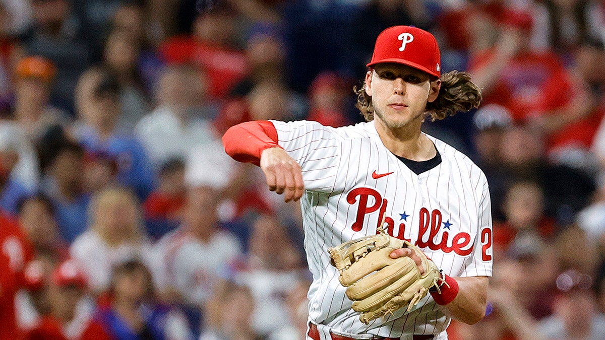 Phillies Alec Bohm throws the ball
