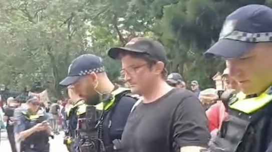 A 33-year-old man was arrested by officers outside Queensland parliament on Wednesday.