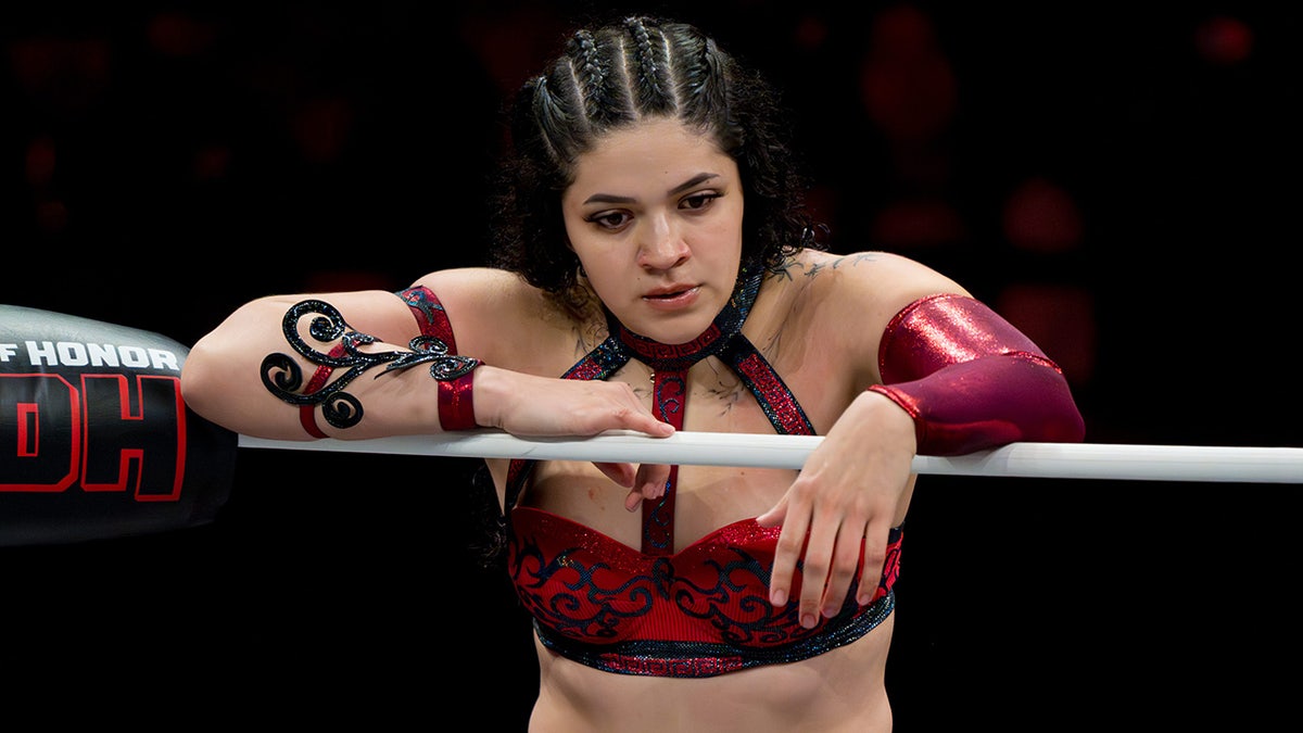 Persephone standing on the apron