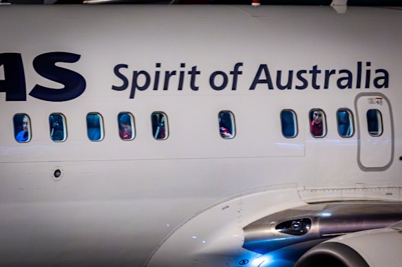 Players on board the Qantas flight that took them from the Gold Coast to Sydney.