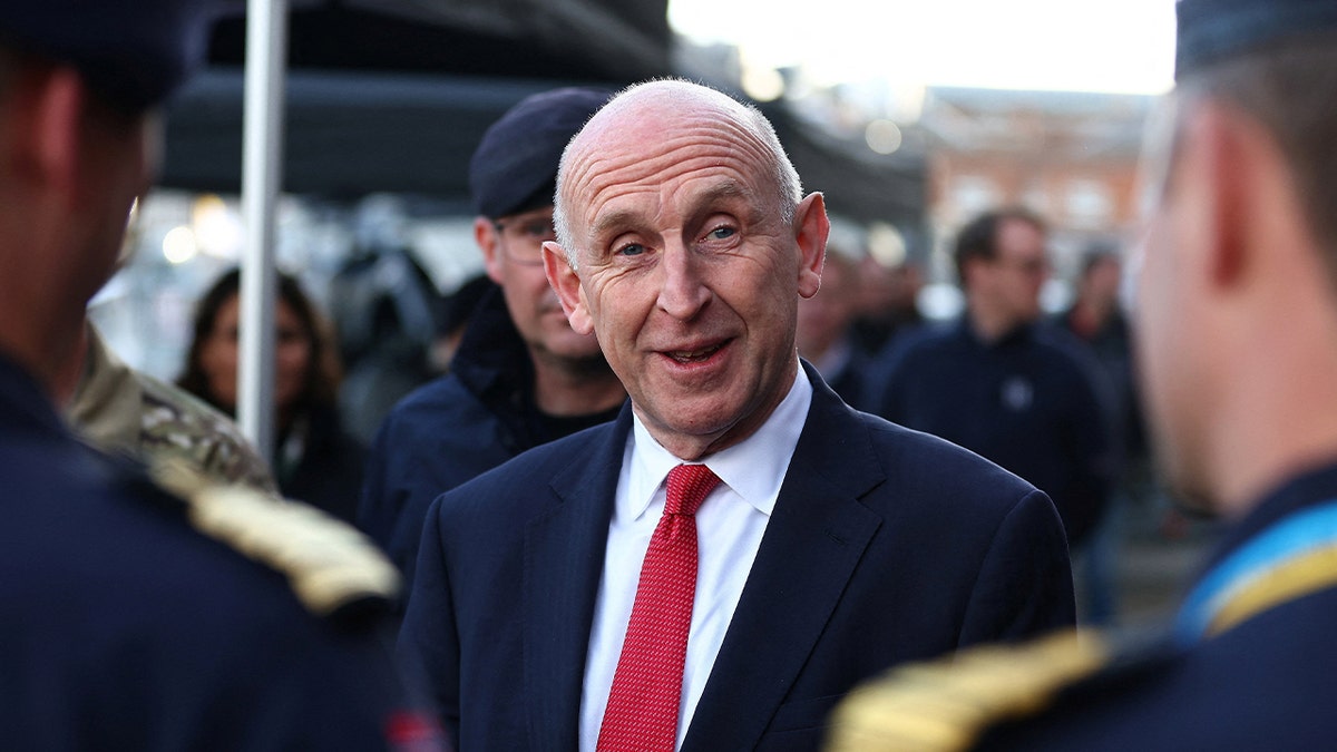 Britain's Defence Secretary John Healey speaks with British and Norwegian naval personnel at the unveiling of the Atlantic Bastion programme, in Portsmouth, Britain, December 4, 2025.