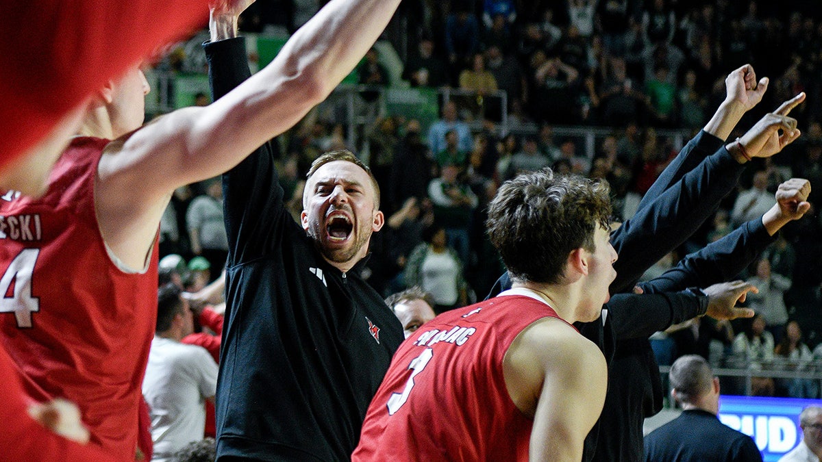 Miami (Ohio) bench reacts after defeating Ohio