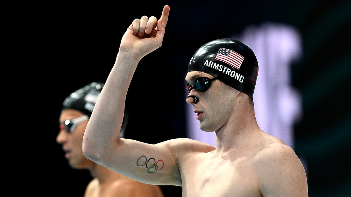 Hunter Armstrong prepares to swim