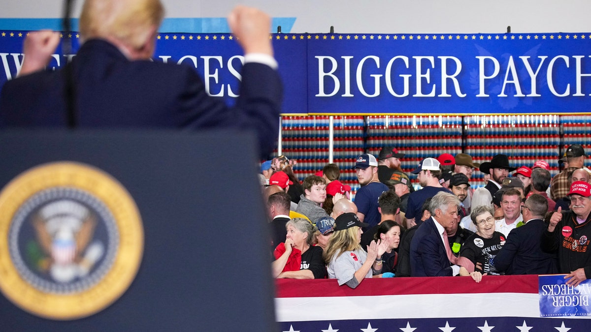 President Donald Trump cheers on Dr. Oz