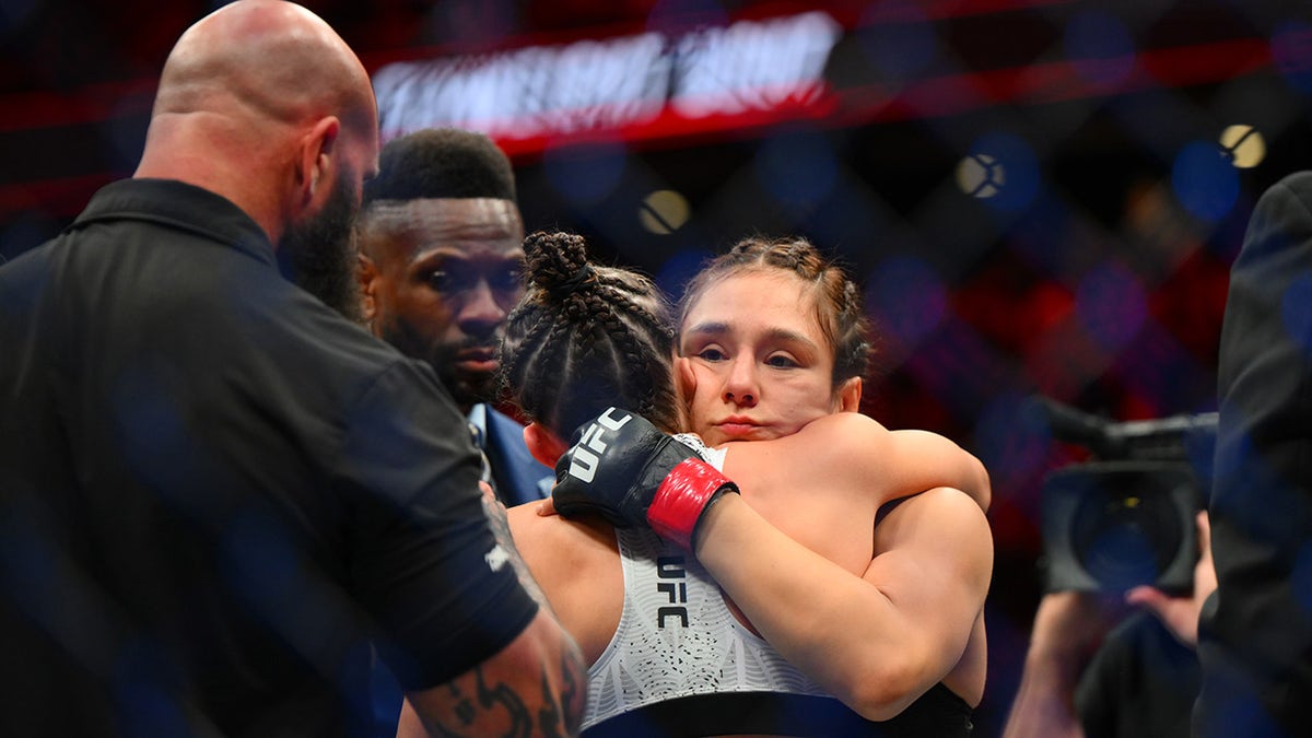 Alexa Grasso hugs Maycee Barber