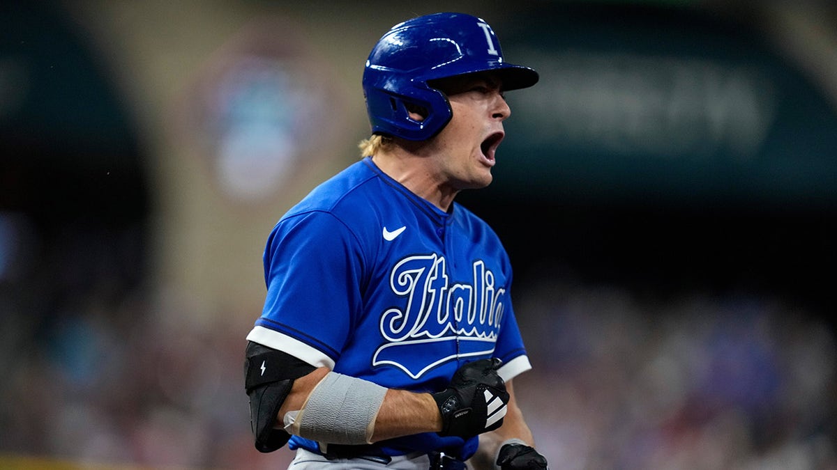 Kyle Teel celebrates a home run
