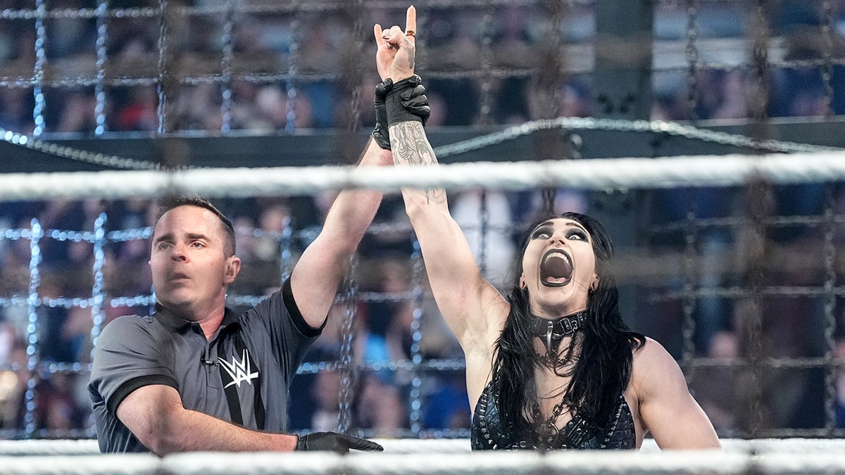 Rhea Ripely points to the sky