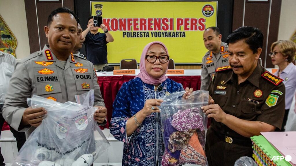 Indonesian police charge 13 in daycare abuse scandal