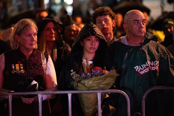 Thousands braved the threatening weather to attend the Anzac Day dawn service in the heart of Brisbane’s CBD.