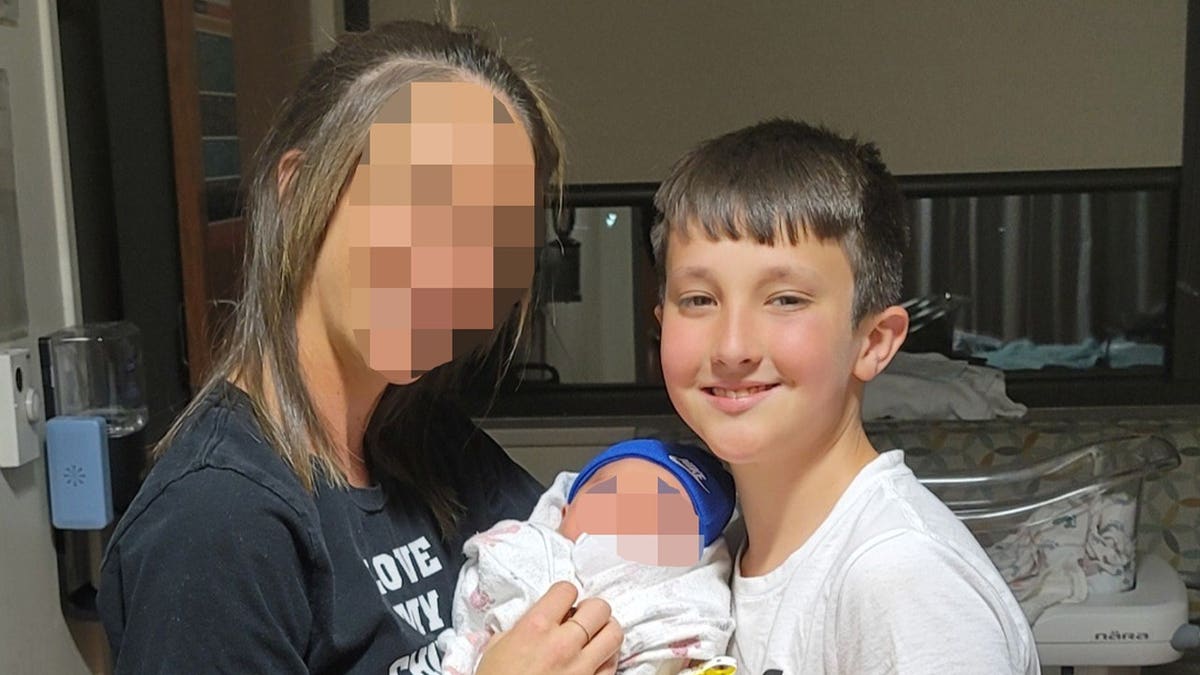 Miles Young with family in hospital photo before Missouri ambush killing