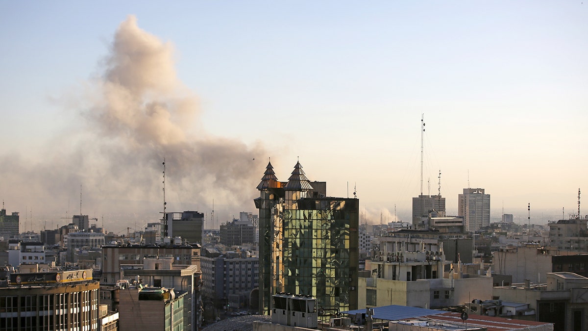 Smoke rising over central Tehran after reported U.S. and Israeli strikes