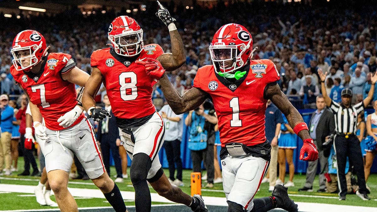 Georgia wide receiver Zachariah Branch celebrates touchdown with Colbie Young in Caesars Superdome