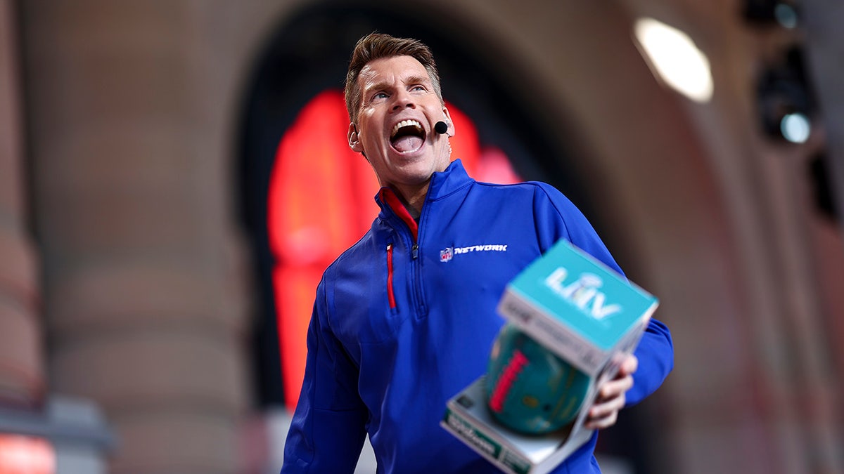 NFL Network host Scott Hanson presenting on stage at the 2023 NFL Draft in Kansas City Missouri