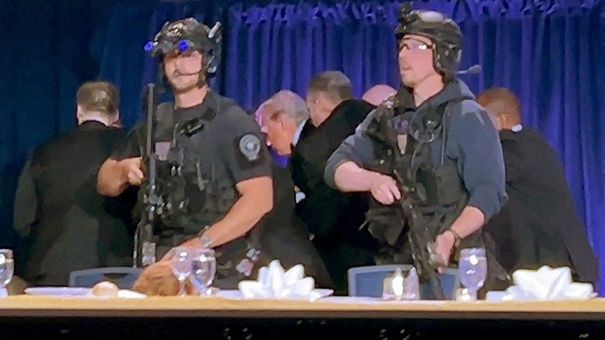 Trump being removed by security from the White House Correspondents' Association Dinner